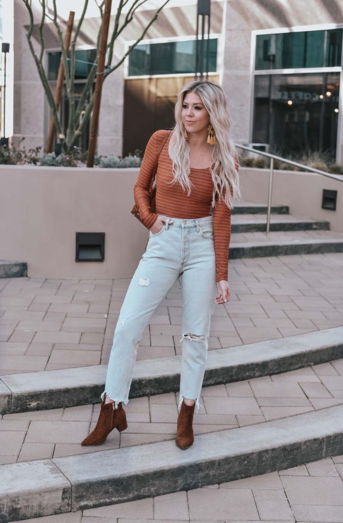 Erin Elizabeth of Wink and a Twirl shares the perfect casual look from Lulus - A pair of light high waist jeans and a striped bodysuit