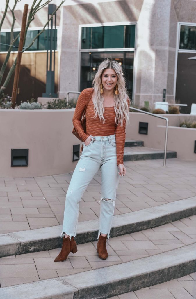 Erin Elizabeth of Wink and a Twirl shares the perfect casual look from Lulus - A pair of light high waist jeans and a striped bodysuit