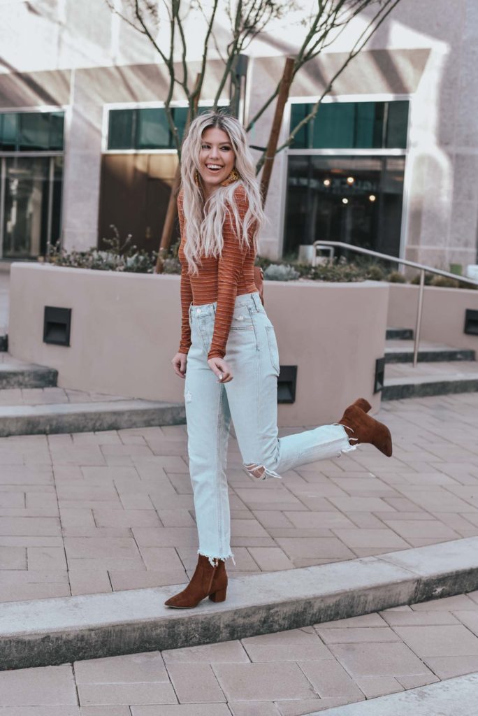 Erin Elizabeth of Wink and a Twirl shares the perfect casual look from Lulus - A pair of light high waist jeans and a striped bodysuit