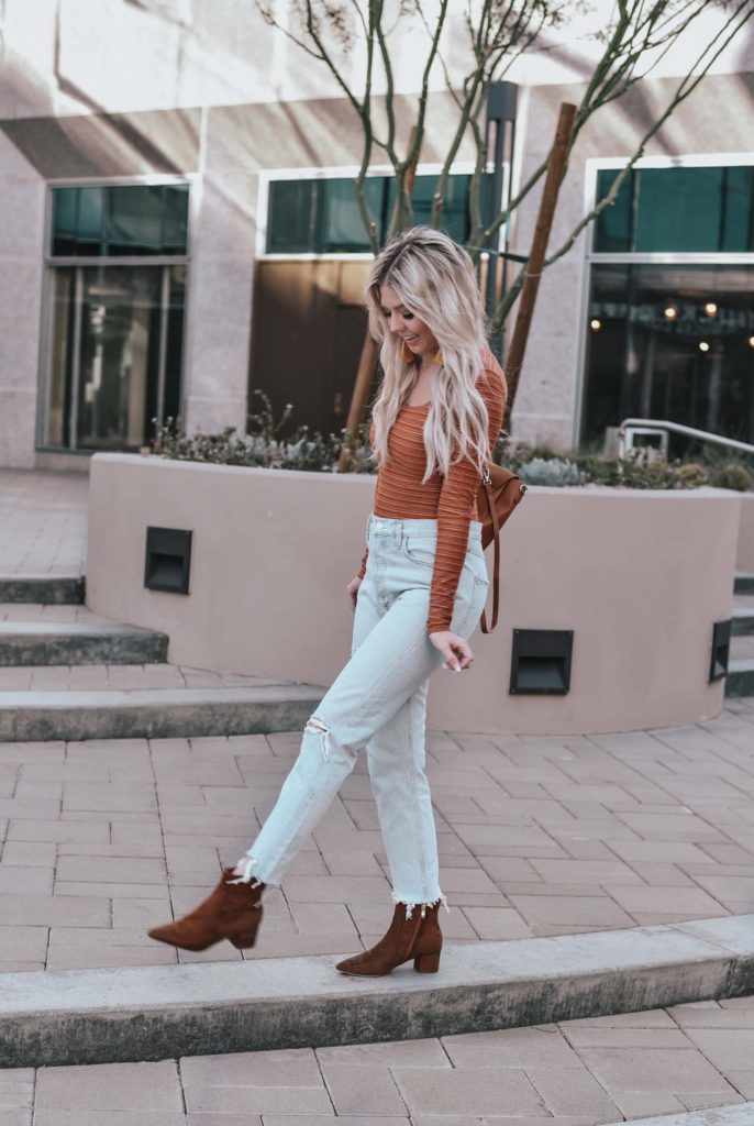 Erin Elizabeth of Wink and a Twirl shares the perfect casual look from Lulus - A pair of light high waist jeans and a striped bodysuit