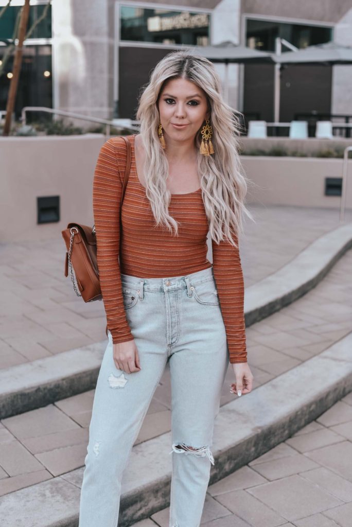 Erin Elizabeth of Wink and a Twirl shares the perfect casual look from Lulus - A pair of light high waist jeans and a striped bodysuit