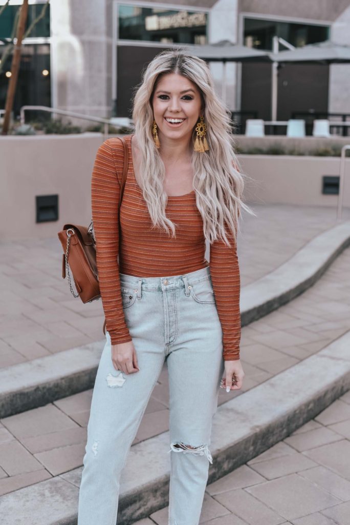 Erin Elizabeth of Wink and a Twirl shares the perfect casual look from Lulus - A pair of light high waist jeans and a striped bodysuit