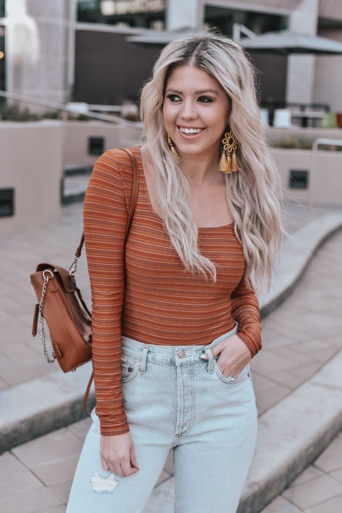 Erin Elizabeth of Wink and a Twirl shares the perfect casual look from Lulus - A pair of light high waist jeans and a striped bodysuit