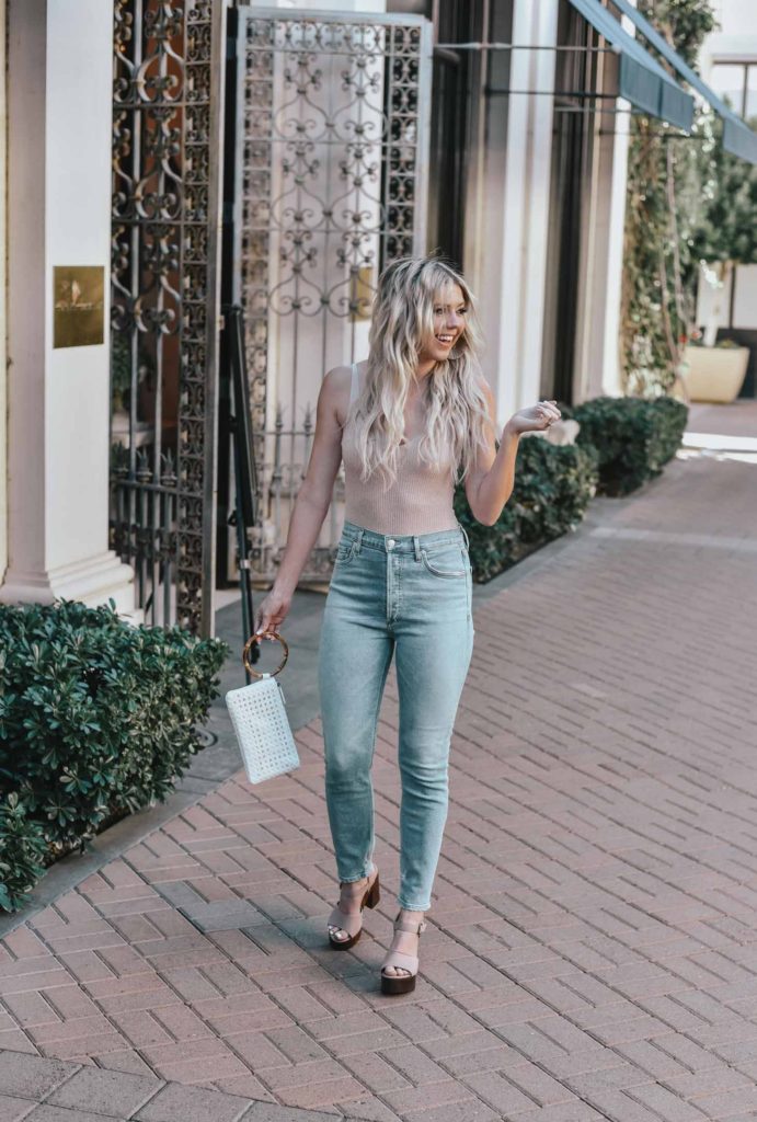 Erin Elizabeth of Wink and a Twirl shares the perfect sexy neutral bodysuit and high waist jeans from Lulus 