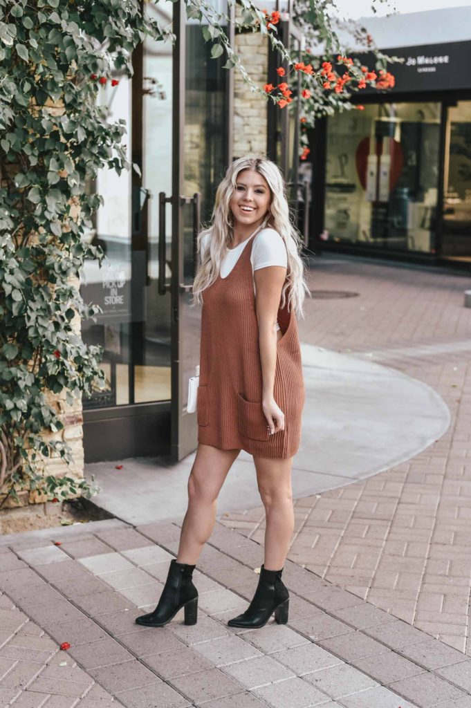 Erin Elizabeth of Wink and a Twirl shares the perfect sweater dress jumper and white tee look from Lulus!