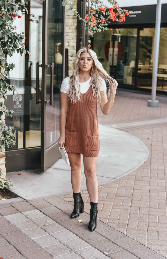 Erin Elizabeth of Wink and a Twirl shares the perfect sweater dress jumper and white tee look from Lulus!