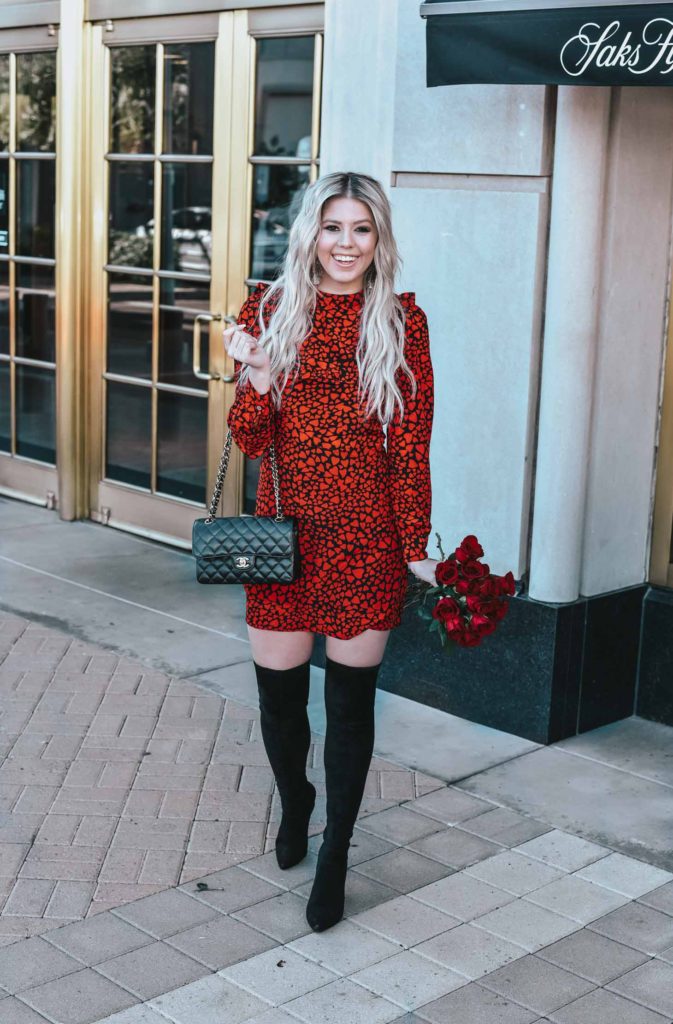 Erin Elizabeth of Wink and a Twirl shares the cutest red and black heart dress and black OTK boots for Valentine's Day from Goodnight Macaroon