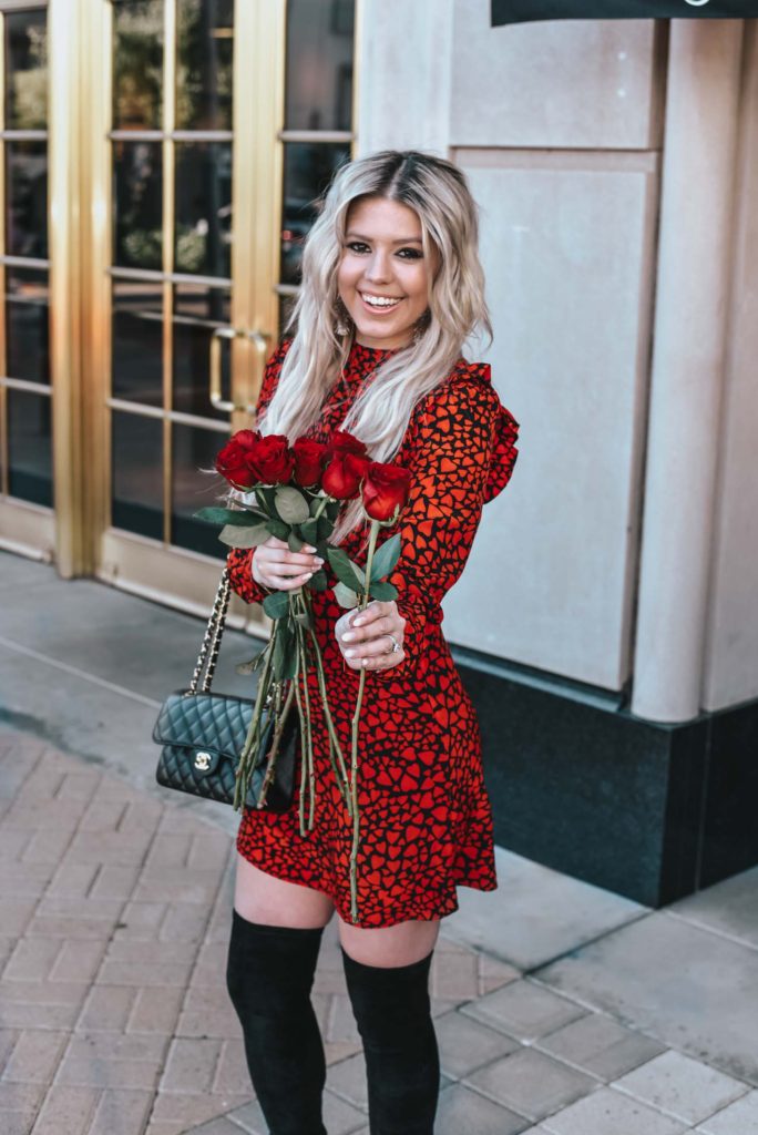 Erin Elizabeth of Wink and a Twirl shares the cutest red and black heart dress and black OTK boots for Valentine's Day from Goodnight Macaroon