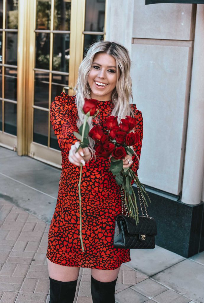 Erin Elizabeth of Wink and a Twirl shares the cutest red and black heart dress and black OTK boots for Valentine's Day from Goodnight Macaroon