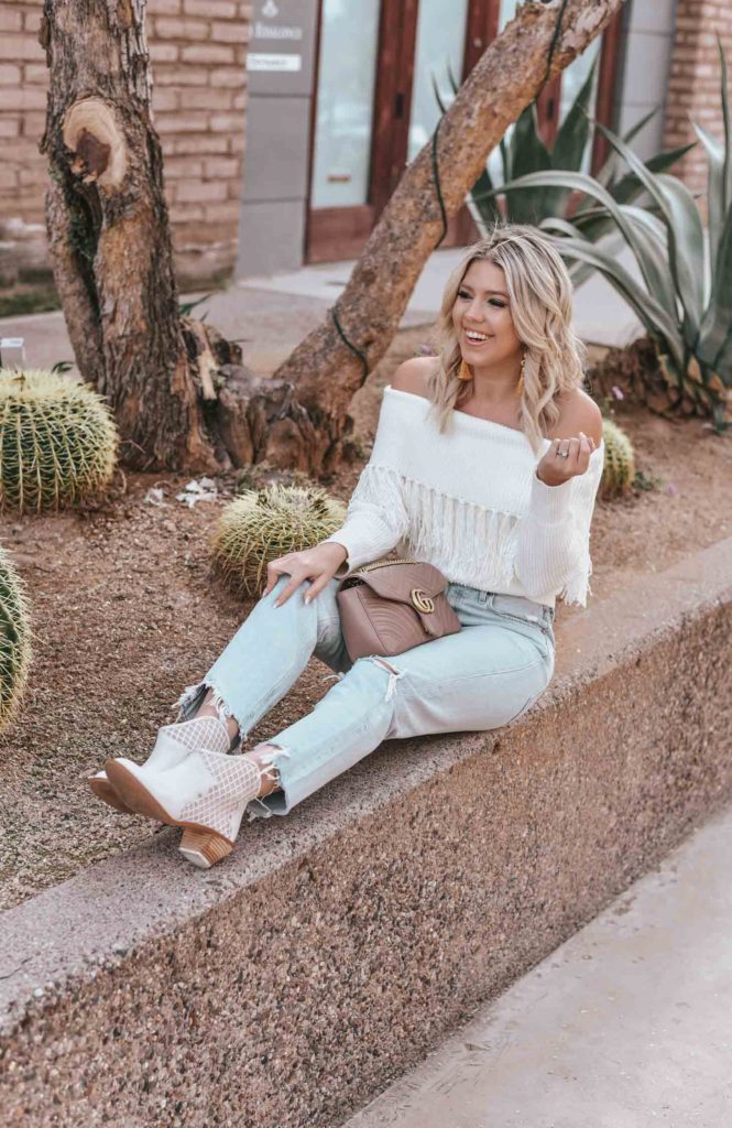 Erin Elizabeth of Wink and a Twirl shares the perfect off the shoulder sweater from Amazon 