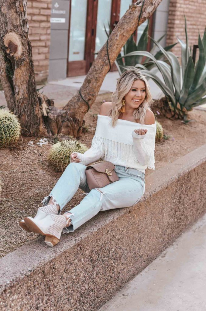 Erin Elizabeth of Wink and a Twirl shares the perfect off the shoulder sweater from Amazon 