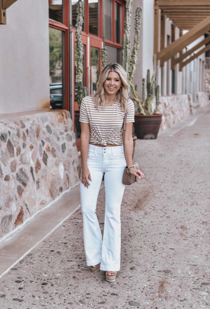 Erin Elizabeth of Wink and a Twirl shares the perfect pair of white flared jeans and neutral striped tee!