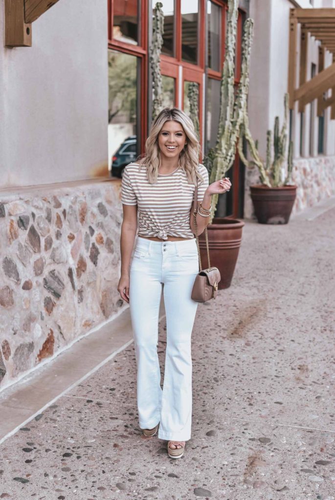 Erin Elizabeth of Wink and a Twirl shares the perfect pair of white flared jeans and neutral striped tee!