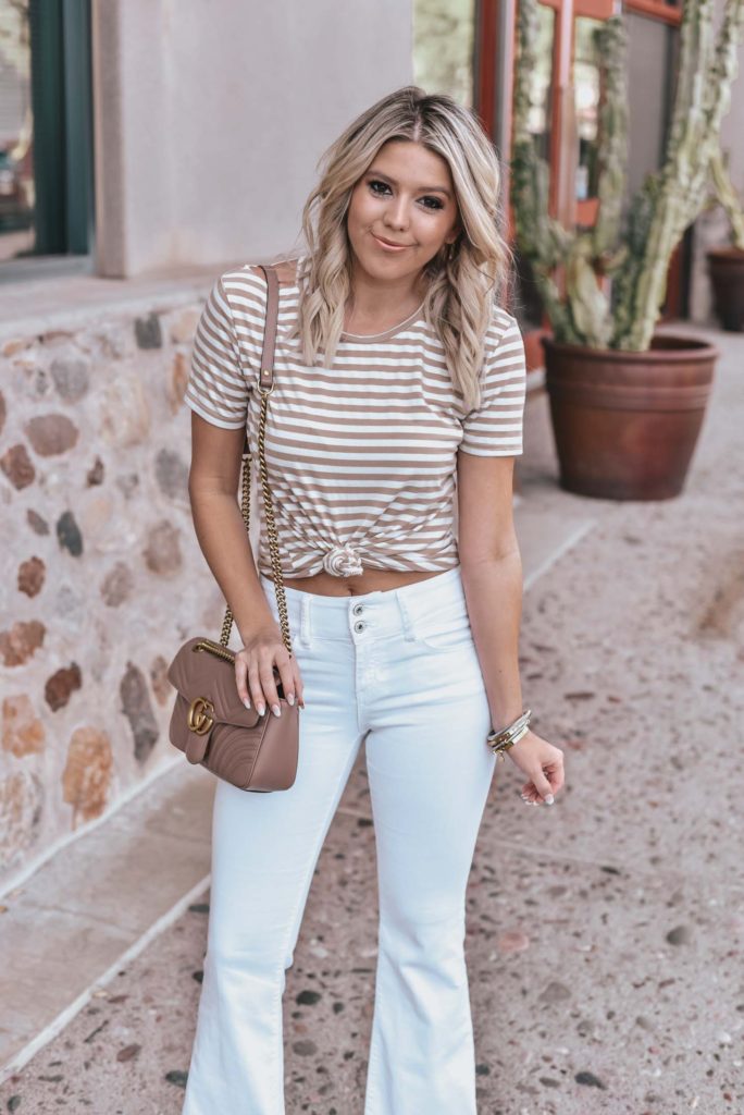 Erin Elizabeth of Wink and a Twirl shares the perfect pair of white flared jeans and neutral striped tee!