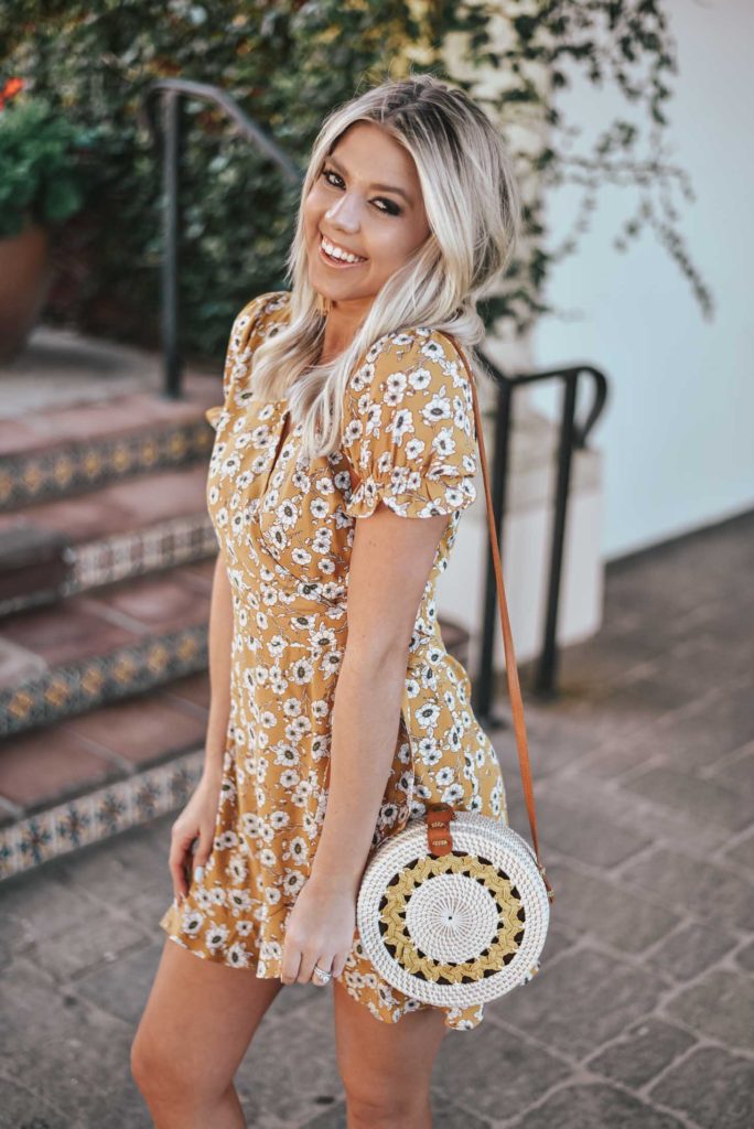 Erin Elizabeth of Wink and a Twirl shares the perfect Springtime dress and white booties from Lulus 