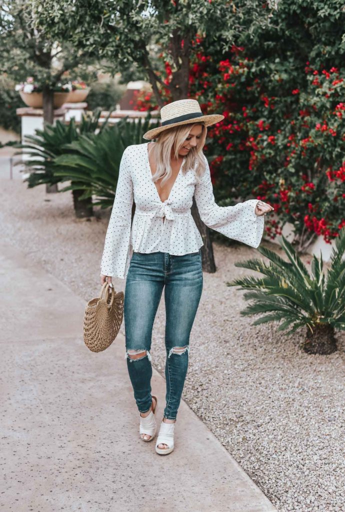 Erin Elizabeth of Wink and a Twirl shares the perfect heart top with flared sleeves from Pink Lily Boutique 
