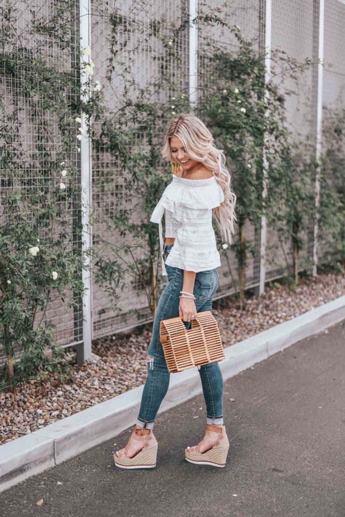 Erin Elizabeth of Wink and a Twirl shares the cutest white off the shoulder peasant top from Chicwish 