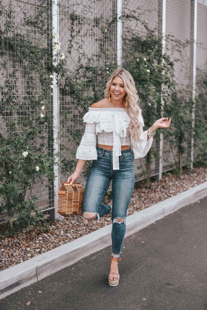 Erin Elizabeth of Wink and a Twirl shares the cutest white off the shoulder peasant top from Chicwish 