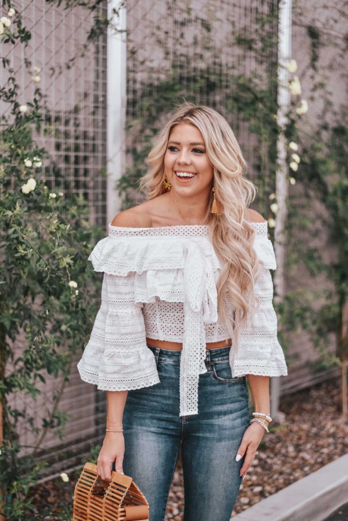 Erin Elizabeth of Wink and a Twirl shares the cutest white off the shoulder peasant top from Chicwish 