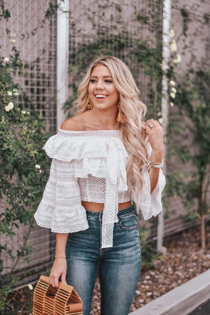 Erin Elizabeth of Wink and a Twirl shares the cutest white off the shoulder peasant top from Chicwish 