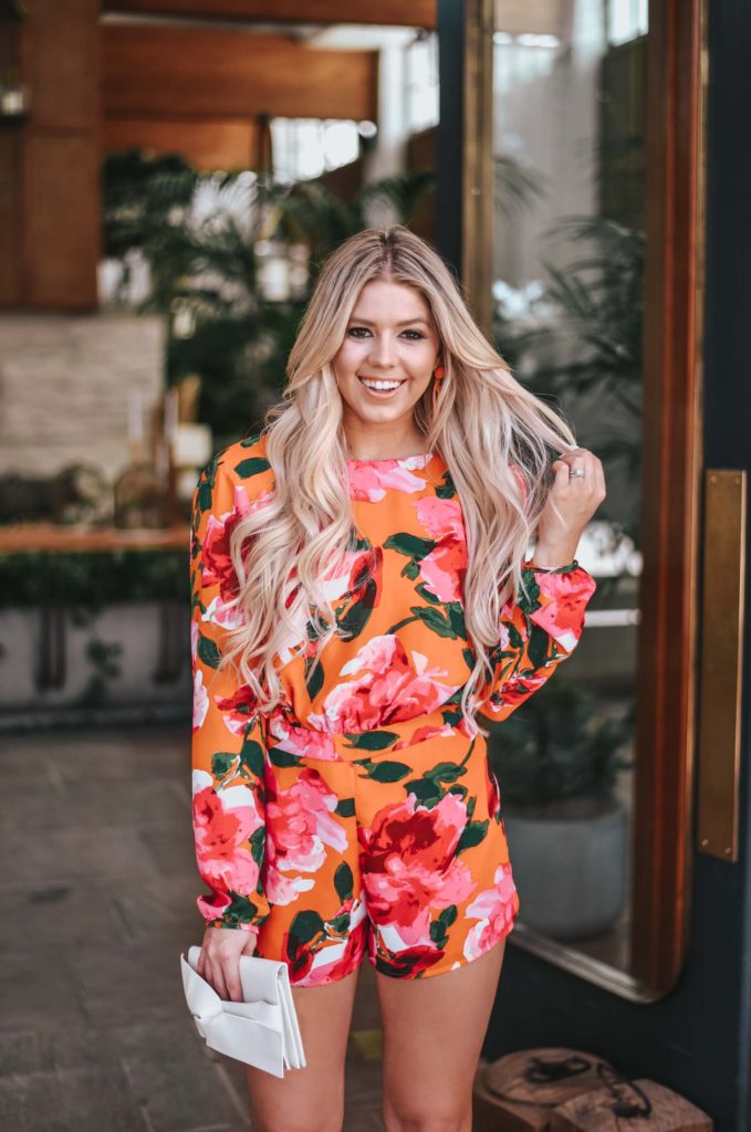 Erin Elizabeth of Wink and a Twirl shares the perfect floral romper and orange platform heels from Lulus