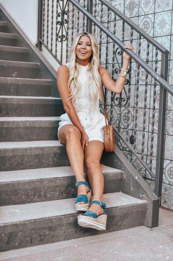 Erin Elizabeth of Wink and a Twirl shares the perfect all white look with a pop of blue with these Marc Fisher Espadrille Wedges